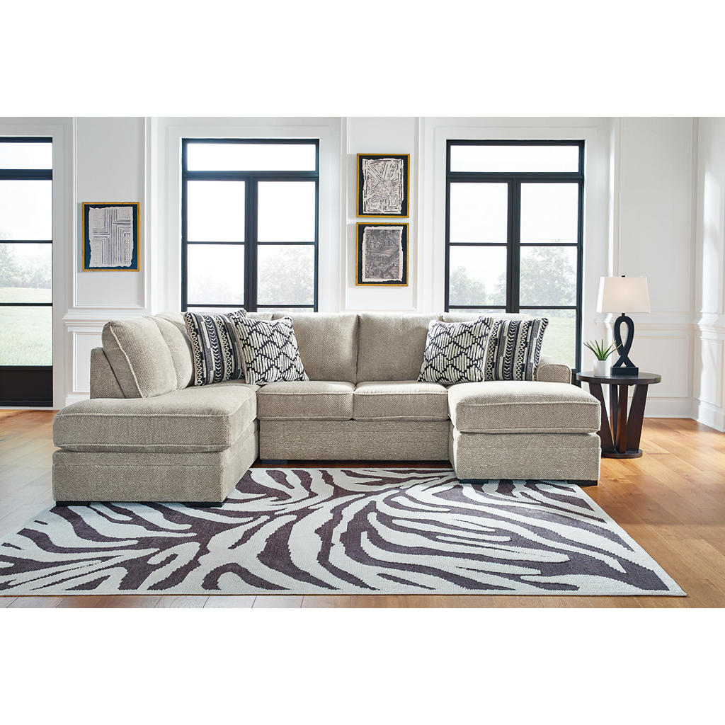 Calnita 2-Piece Sectional with Chaise Benchcraft® Living Room