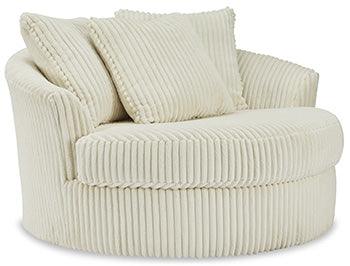 Lindyn Oversized Swivel Accent Chair — Ivory 360-Degree Nest Signature Design by Ashley® Living Room