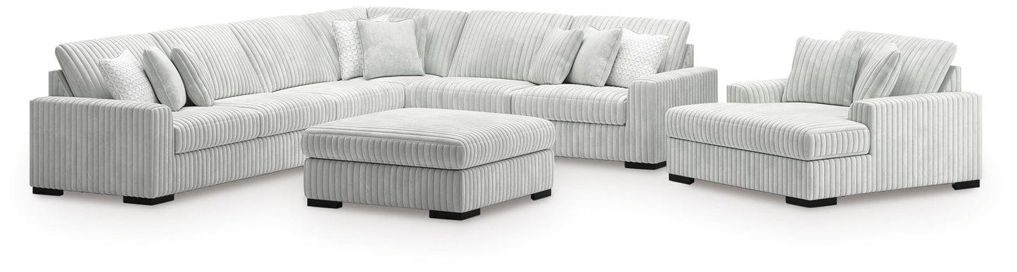 Stupendous 4-Piece Sectional, Oversized Chaise and Ottoman — Alloy Signature Design by Ashley® Living Room