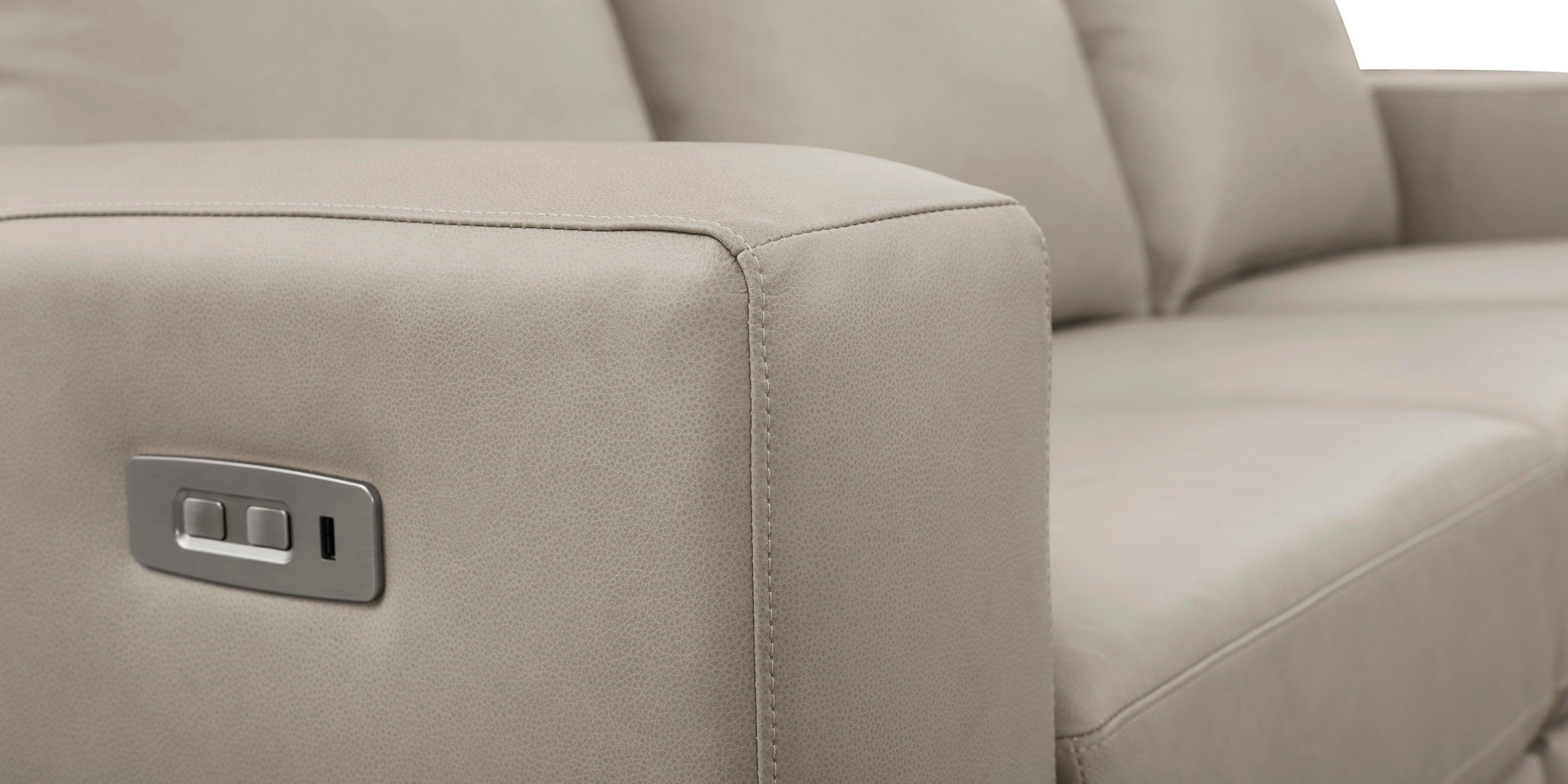 Somers Leather Track Arm Reclining Sofa Bassett