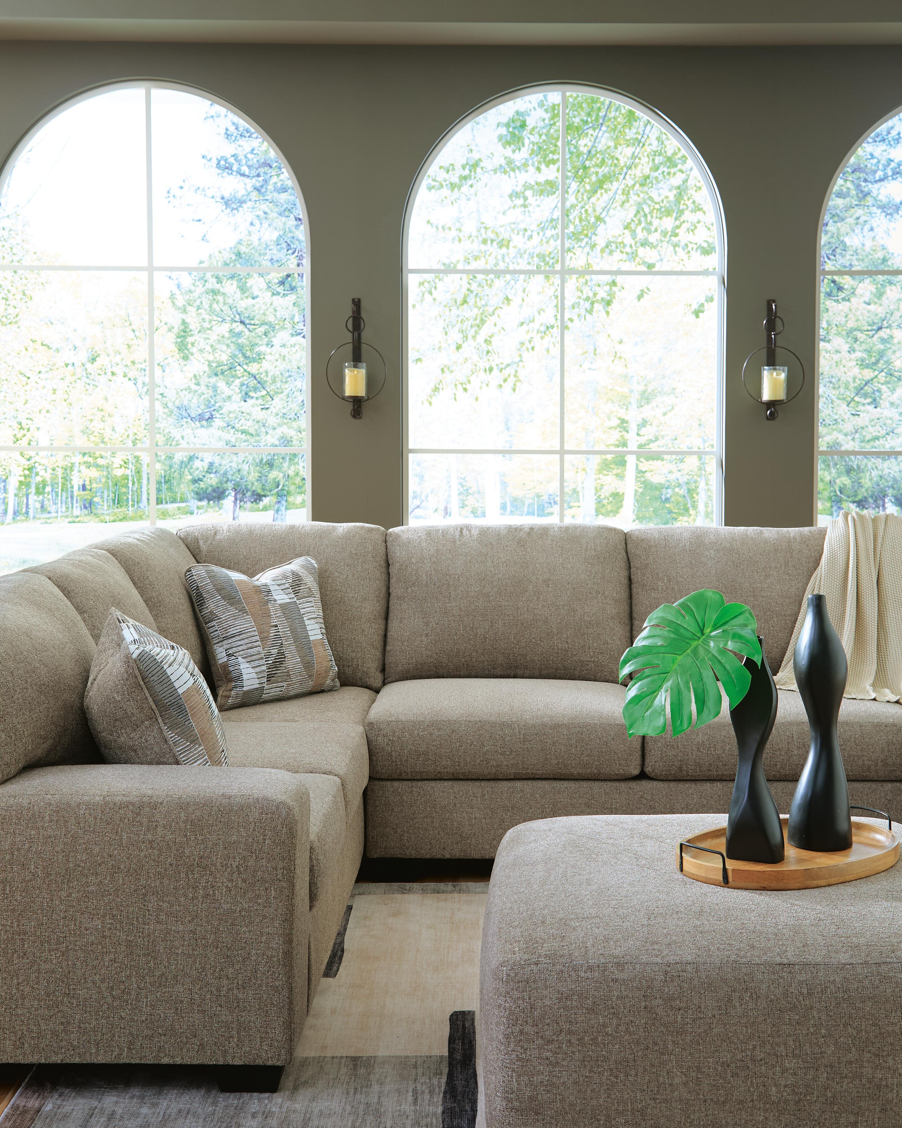 Newellen 3-Piece Sectional and Oversized Ottoman — Wedge Corner Benchcraft® Living Room