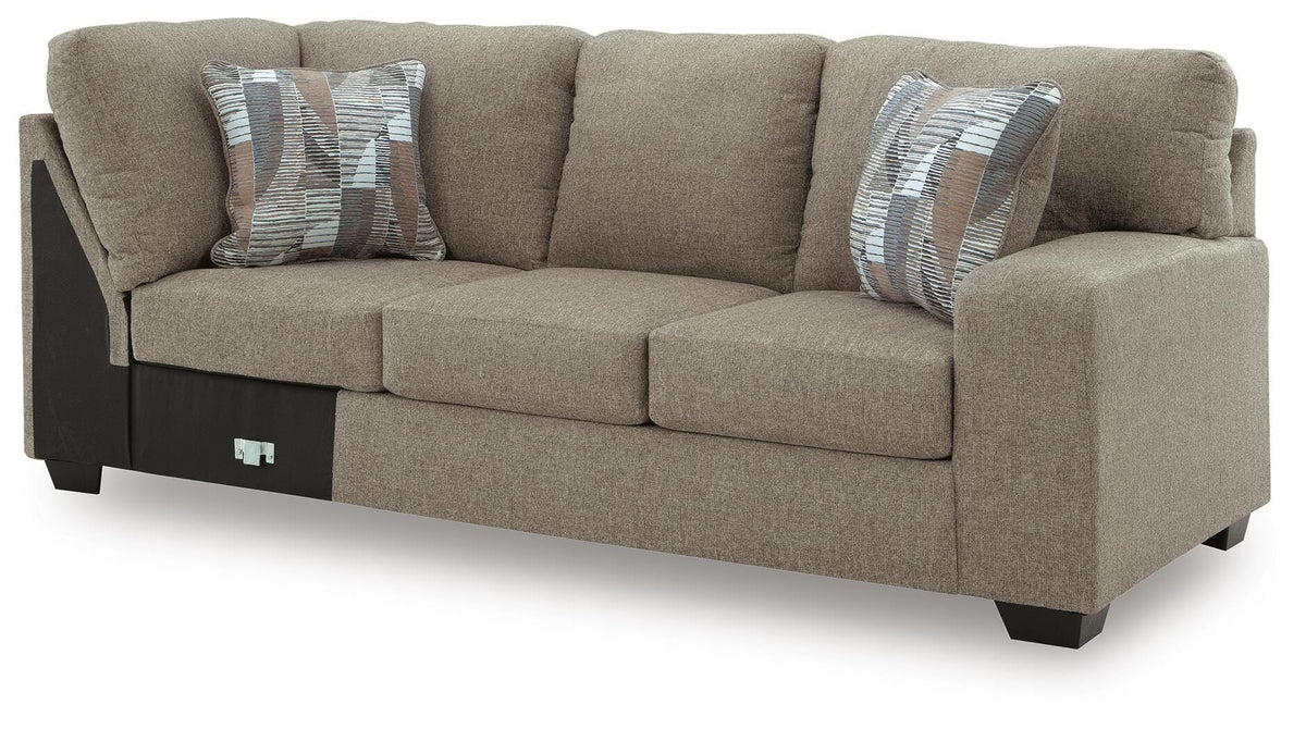 Newellen 3-Piece Sectional and Oversized Ottoman — Wedge Corner Benchcraft® Living Room