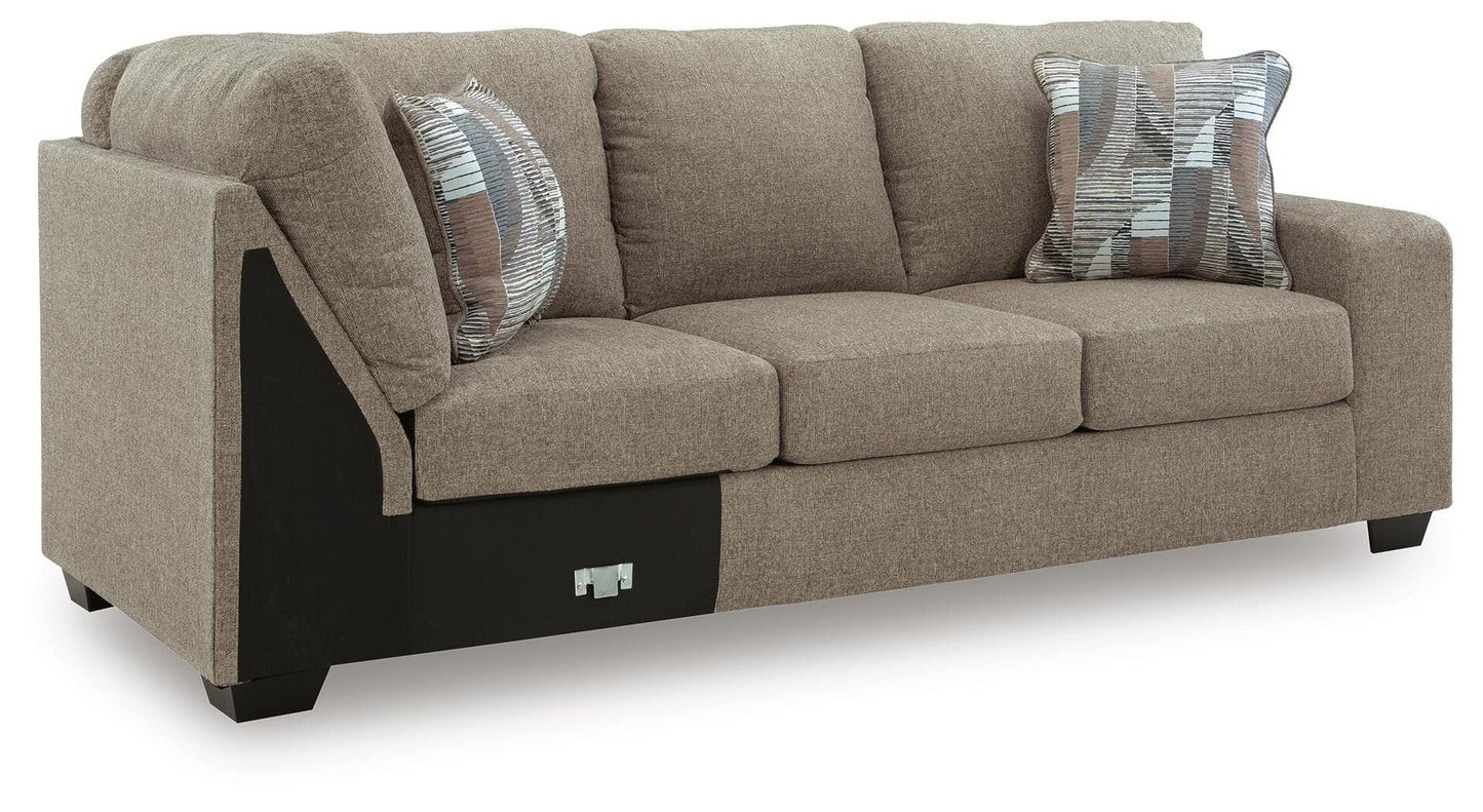 Newellen 3-Piece Sectional and Oversized Ottoman — Wedge Corner Benchcraft® Living Room