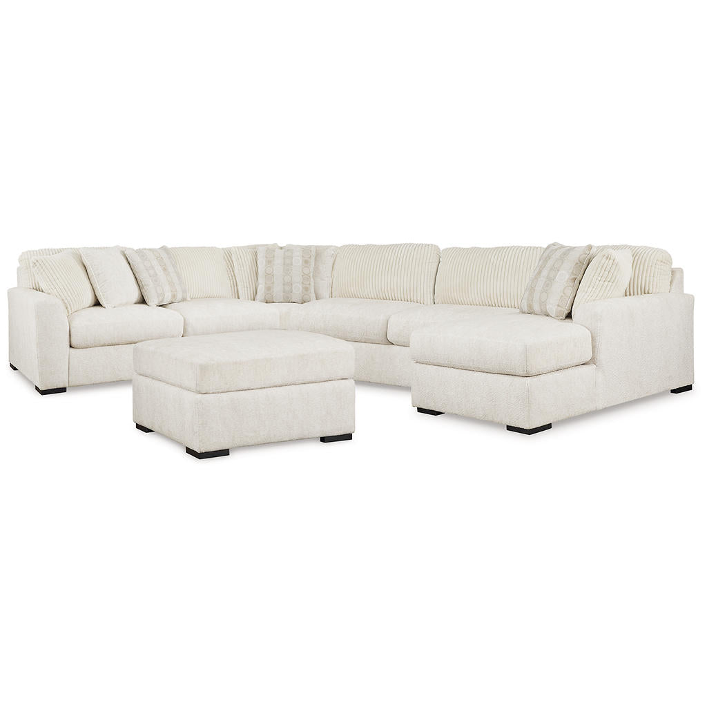 Chessington 4-Piece Sectional and Oversized Accent Ottoman Signature Design by Ashley® Uncategorized