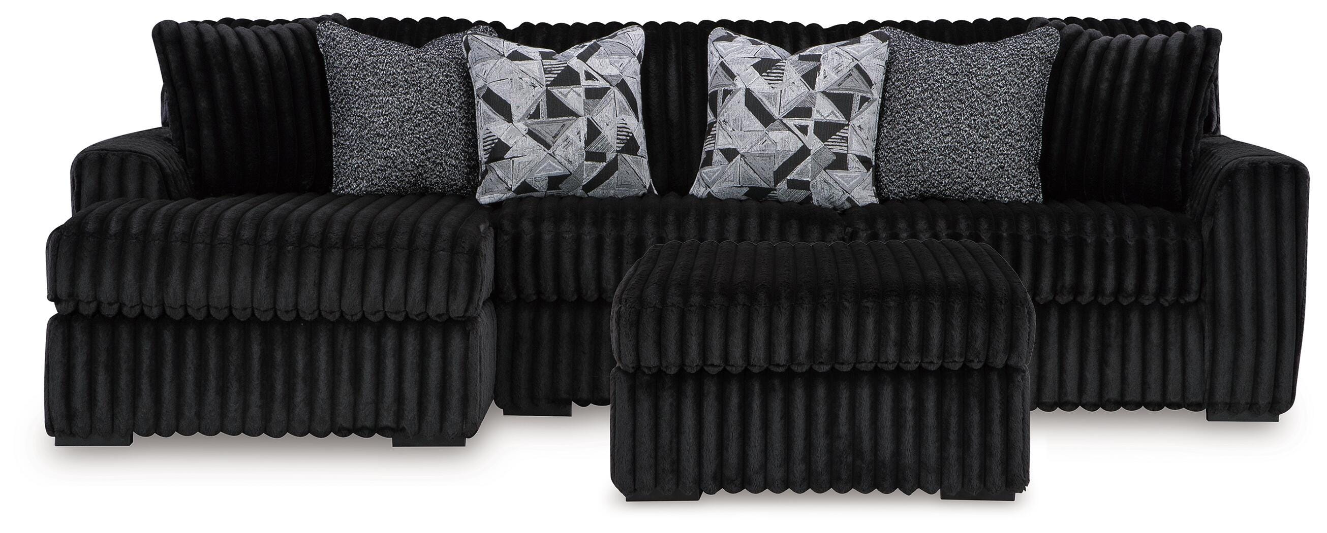 Midnight-Madness 2-Pc Sectional and Ottoman — Chaise Left (98103) Signature Design by Ashley® Living Room