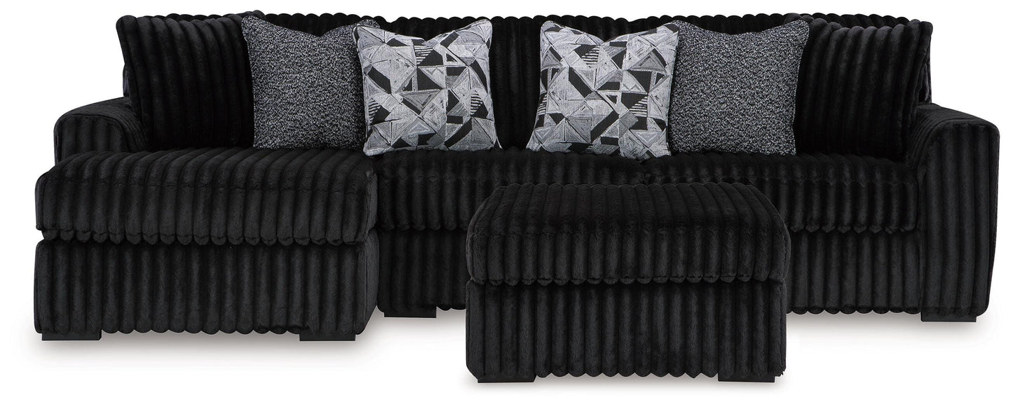 Midnight-Madness 2-Pc Sectional and Ottoman — Chaise Left (98103) Signature Design by Ashley® Living Room