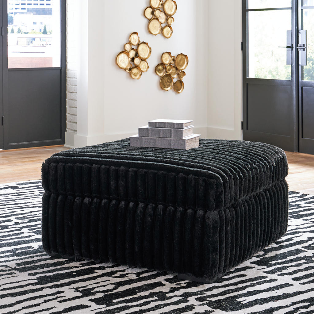 Midnight-Madness 4-Piece Sectional and Oversized Accent Ottoman Signature Design by Ashley® Uncategorized