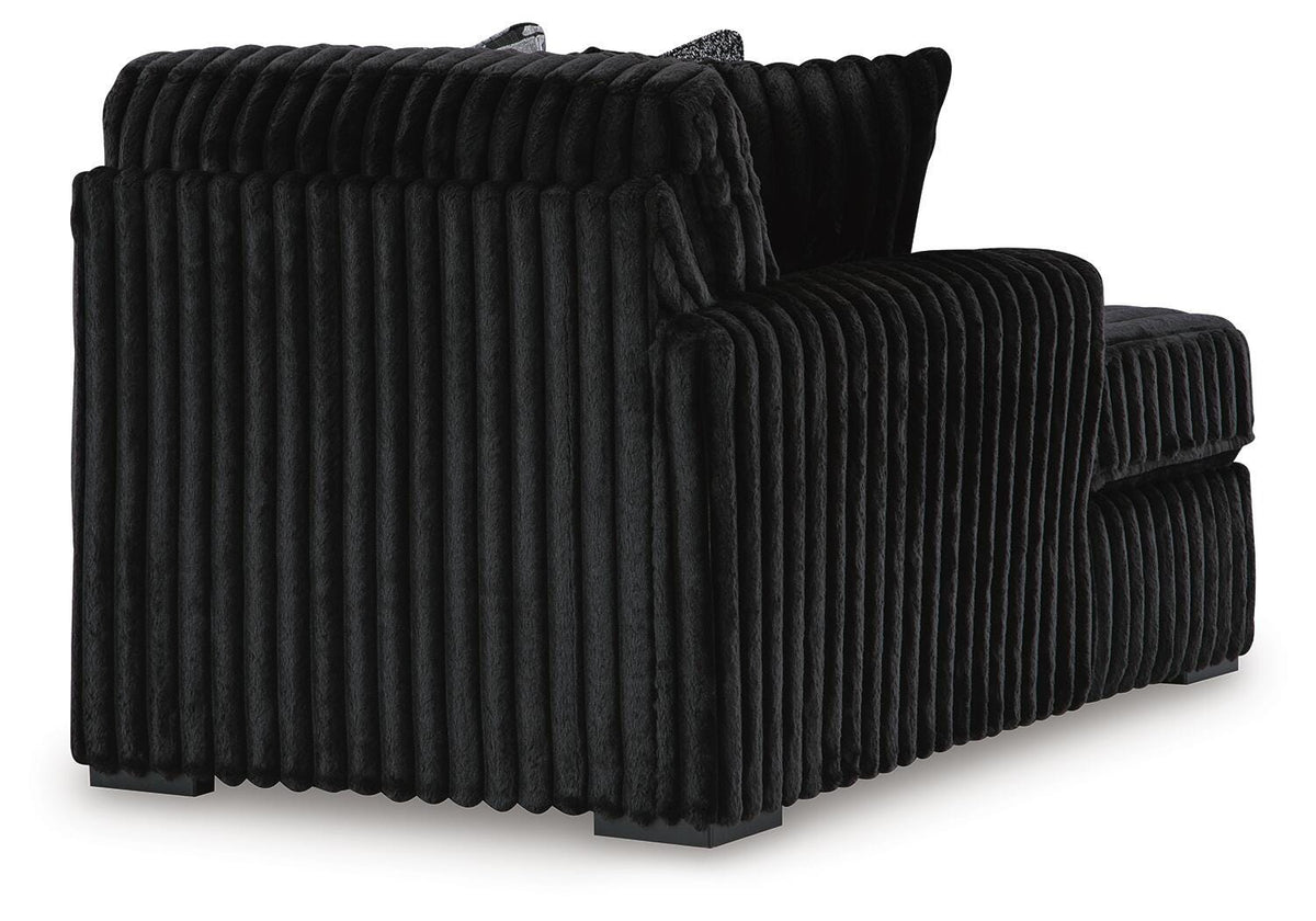 Midnight-Madness 2-Pc Sectional and Ottoman — Chaise Left (98103) Signature Design by Ashley® Living Room