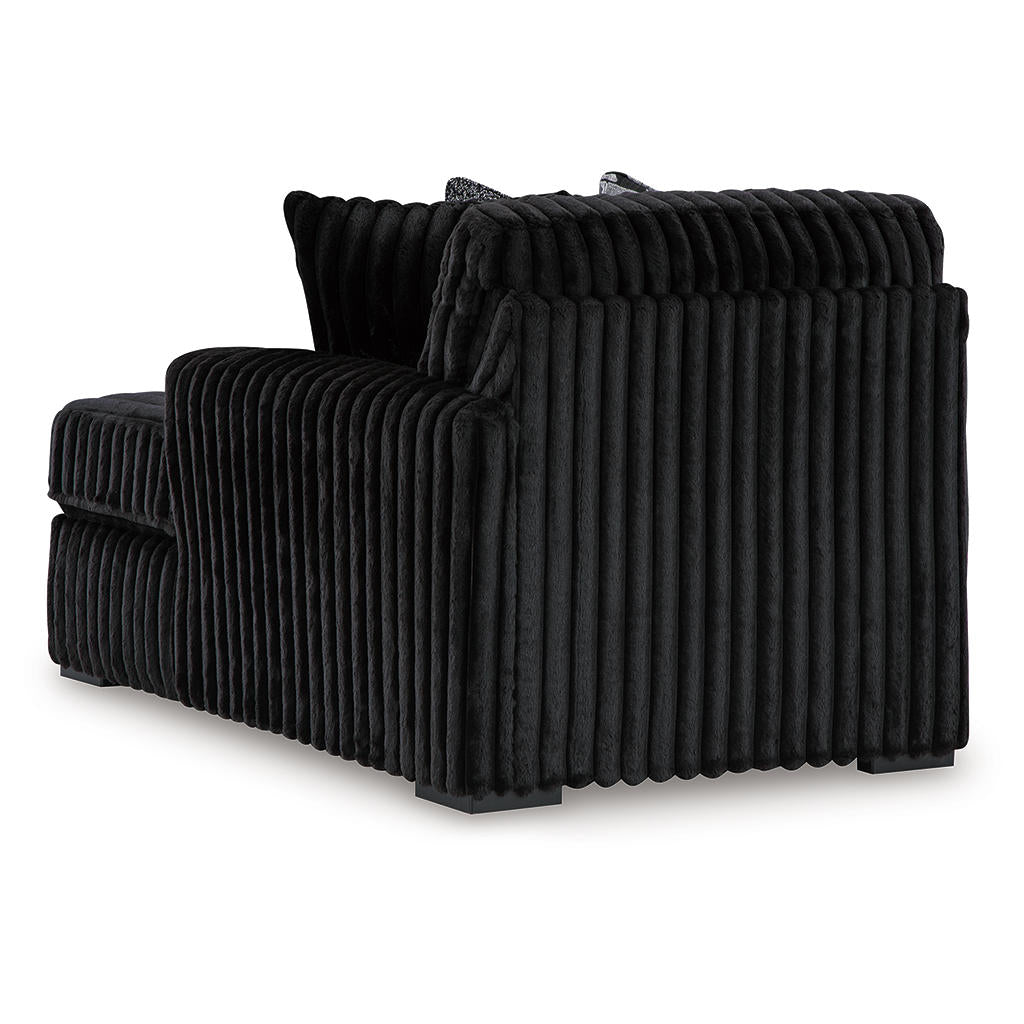 Midnight-Madness 2-Piece Sectional and Oversized Accent Ottoman Signature Design by Ashley® Uncategorized