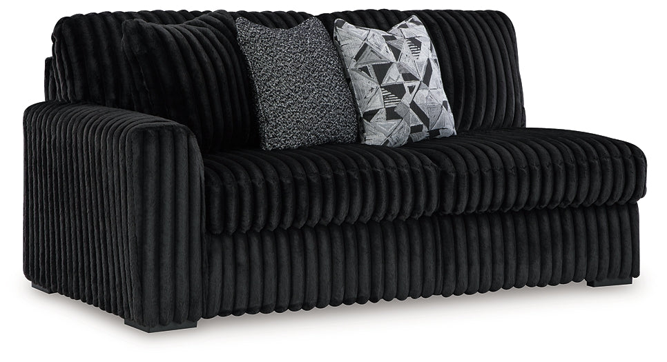 Midnight-Madness 2-Piece Sectional and Oversized Accent Ottoman