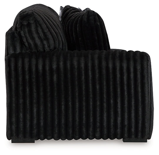 Midnight-Madness 2-Piece Sectional and Oversized Accent Ottoman