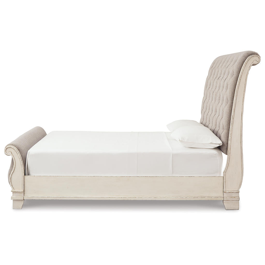 Realyn Queen Upholstered Sleigh Bed and Chest Signature Design by Ashley® Uncategorized