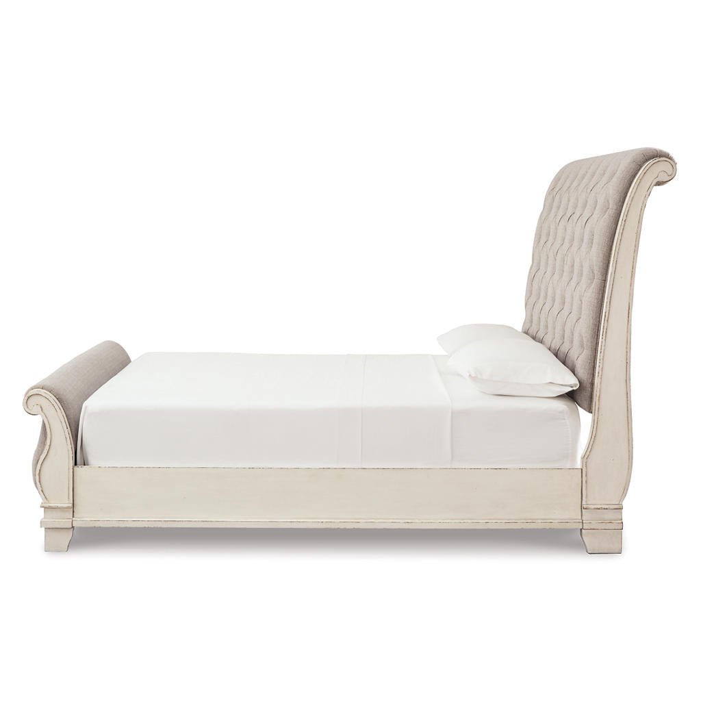 Realyn Queen Sleigh Bed — Button-Tufted, Chipped White Signature Design by Ashley® Bedroom