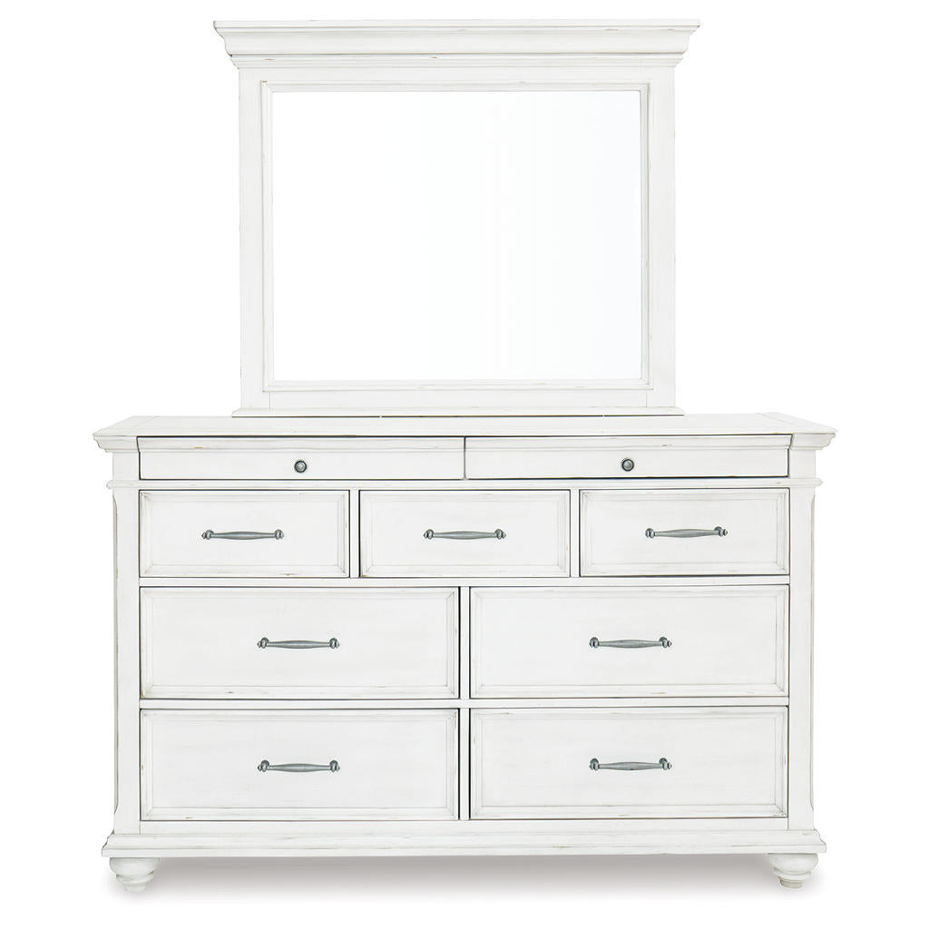 Kanwyn Cal King Upholstered Panel Bed, Dresser, Mirror and Chest Benchcraft® Uncategorized