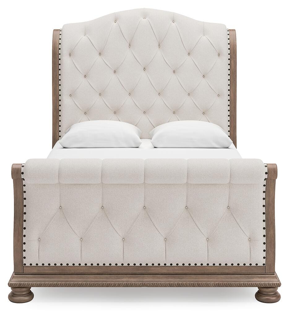 Ardenfield Queen Upholstered Sleigh Bed, Dresser and Mirror Signature Design by Ashley® Bedroom