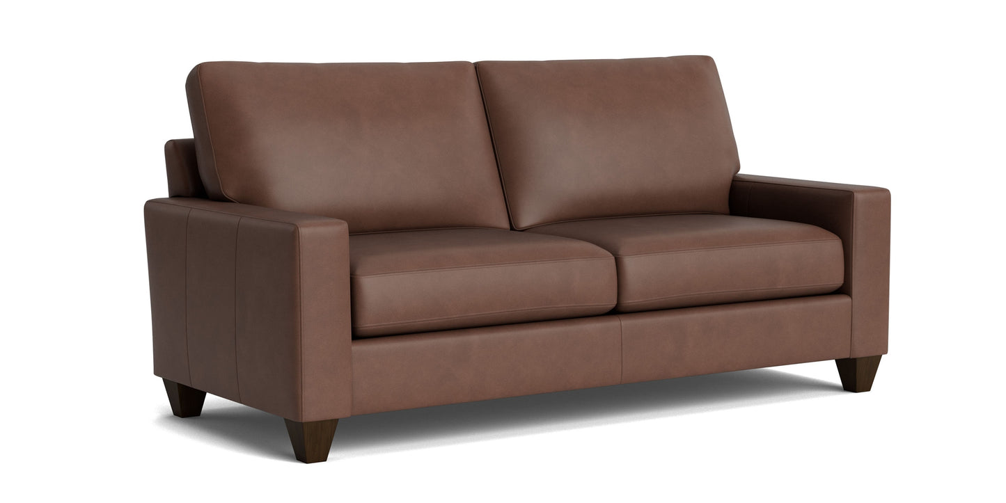True Custom® Leather Large Track Arm Studio Sofa Bassett