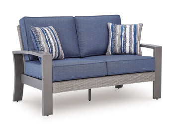 Half Moon Beach Outdoor Loveseat with Cushion Signature Design by Ashley® Outdoor