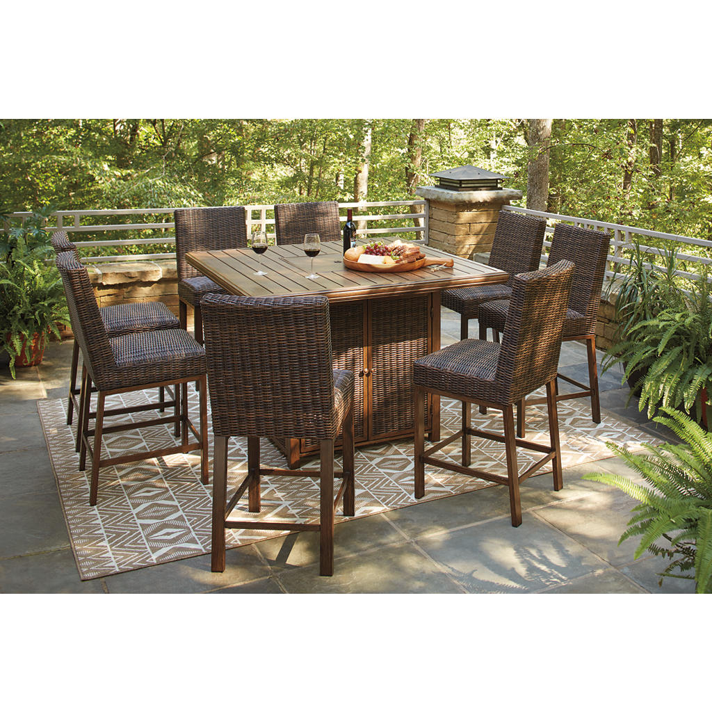Paradise Trail Outdoor Counter Height Dining Table with 6 Barstools Signature Design by Ashley® Uncategorized