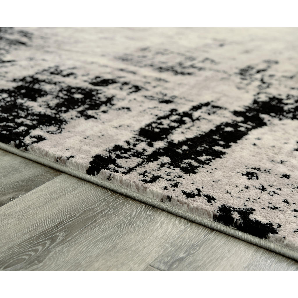 Zekeman 7'10" x 10' Rug Signature Design by Ashley® Rugs