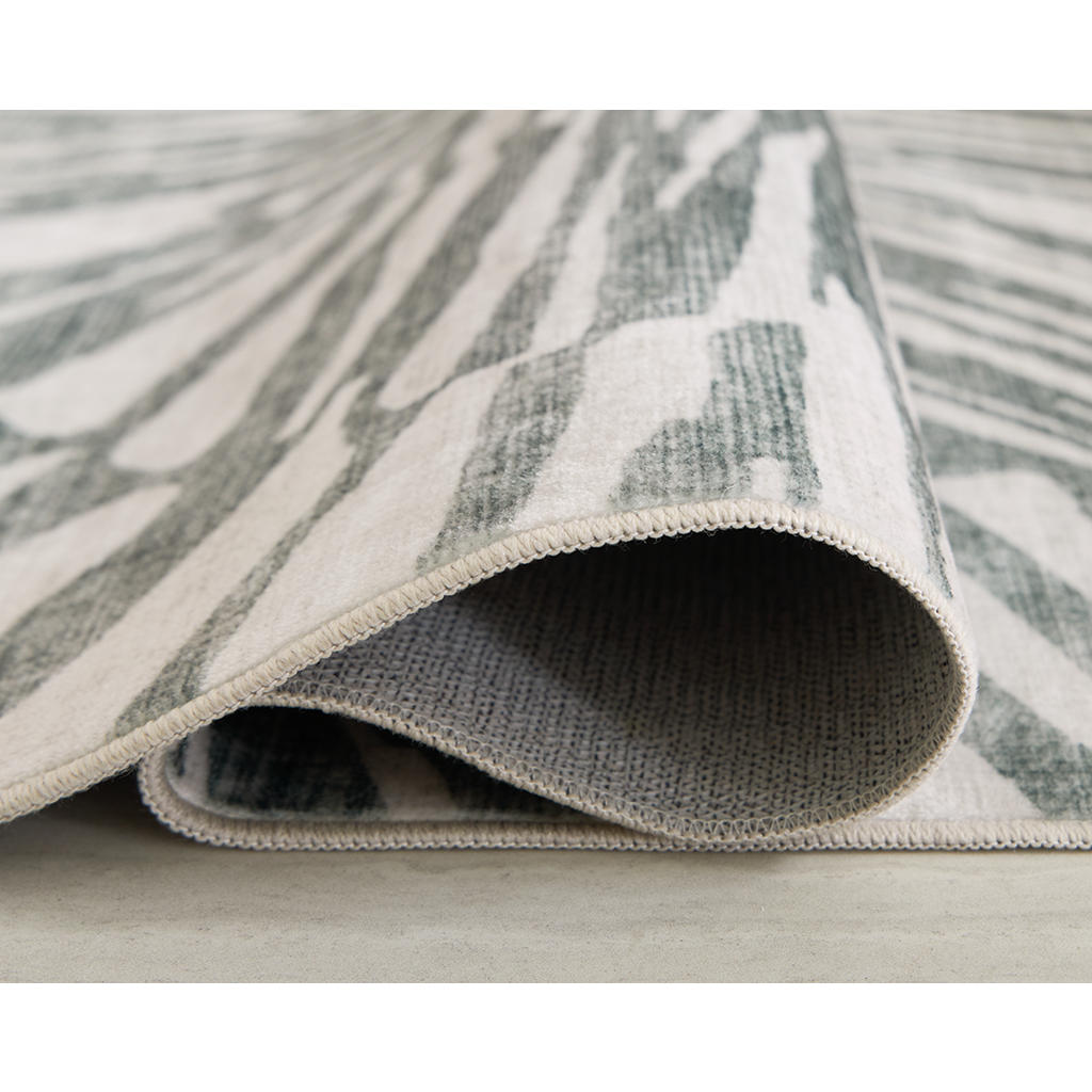 Verland Washable 7'6" x 9'6" Area Rug Signature Design by Ashley® Rugs