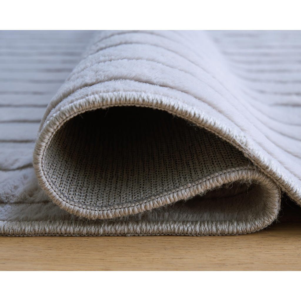 Worthley Washable 5' x 7' Area Rug Signature Design by Ashley® Rugs