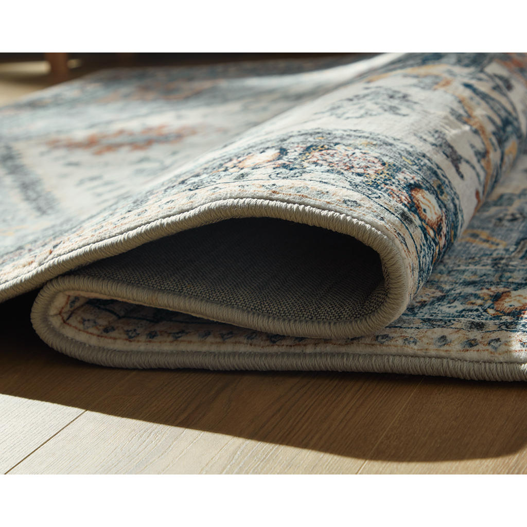 Wallney 7'6" x 9'6" Area Rug Signature Design by Ashley® Rugs