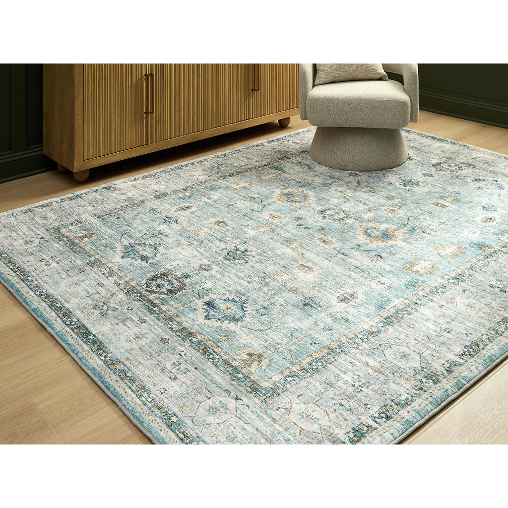 Ladstoney 7'6" x 9'6" Area Rug Signature Design by Ashley® Rugs