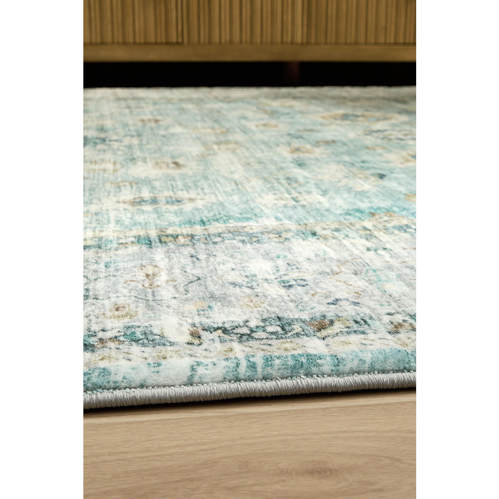 Ladstoney 7'6" x 9'6" Area Rug Signature Design by Ashley® Rugs