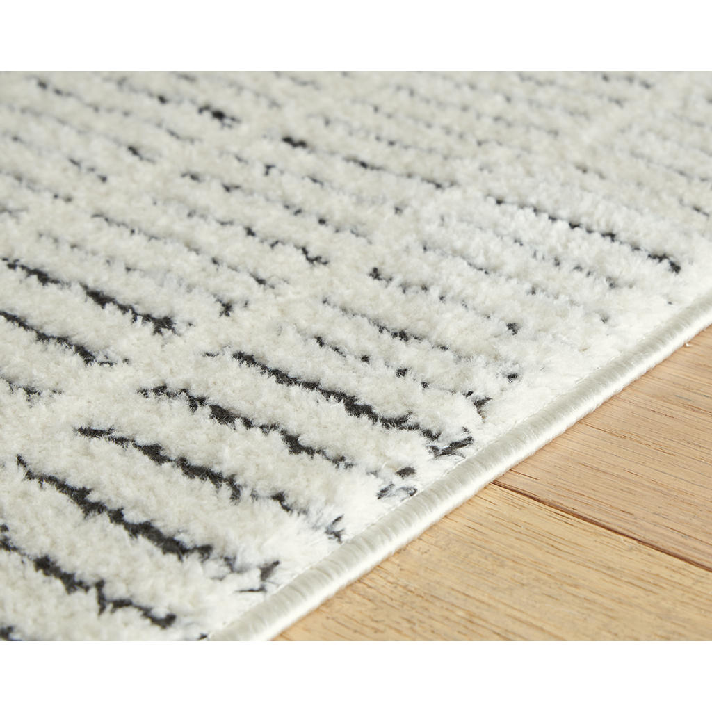 Turinwith 5'3" x 7' Area Rug Signature Design by Ashley® Rugs
