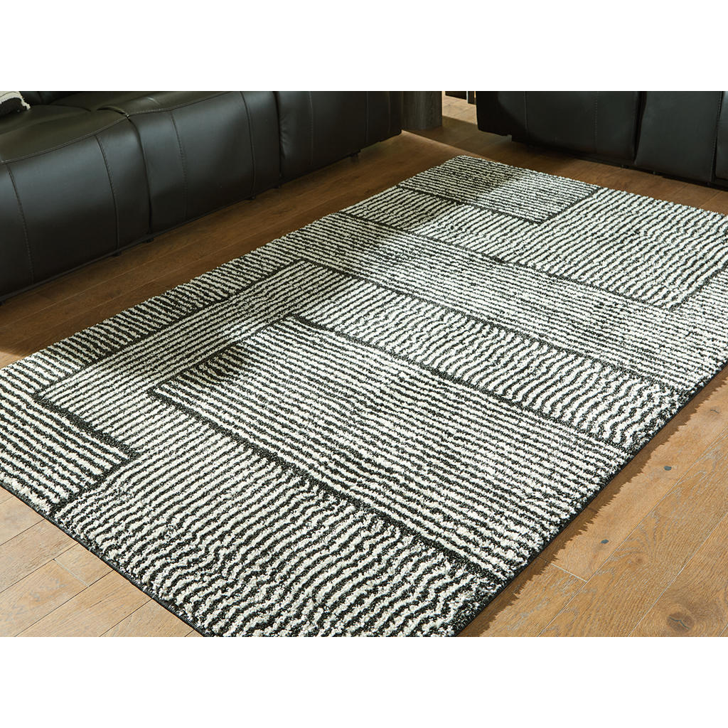 Kurtmen 5' x 7' Area Rug Signature Design by Ashley® Rugs
