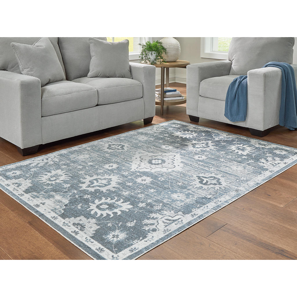 Avanworths Washable 5'3" x 7' Area Rug Signature Design by Ashley® Rugs