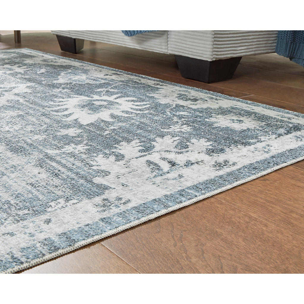 Avanworths Washable 5'3" x 7' Area Rug Signature Design by Ashley® Rugs