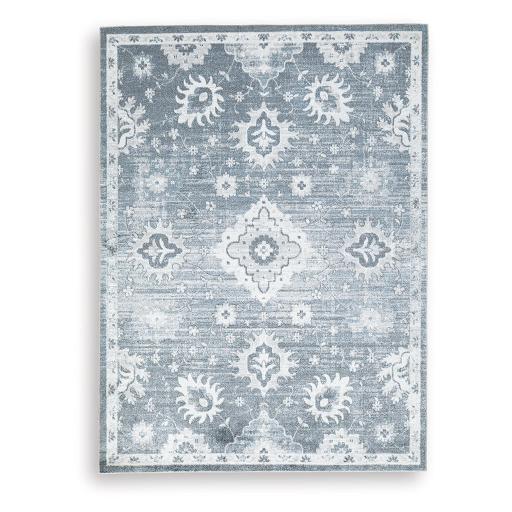 Avanworths Washable 5'3" x 7' Area Rug Signature Design by Ashley® Rugs