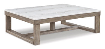 Loyaska Coffee Table — Natural Marble Top on Oak-Tone Base Signature Design by Ashley® Living Room