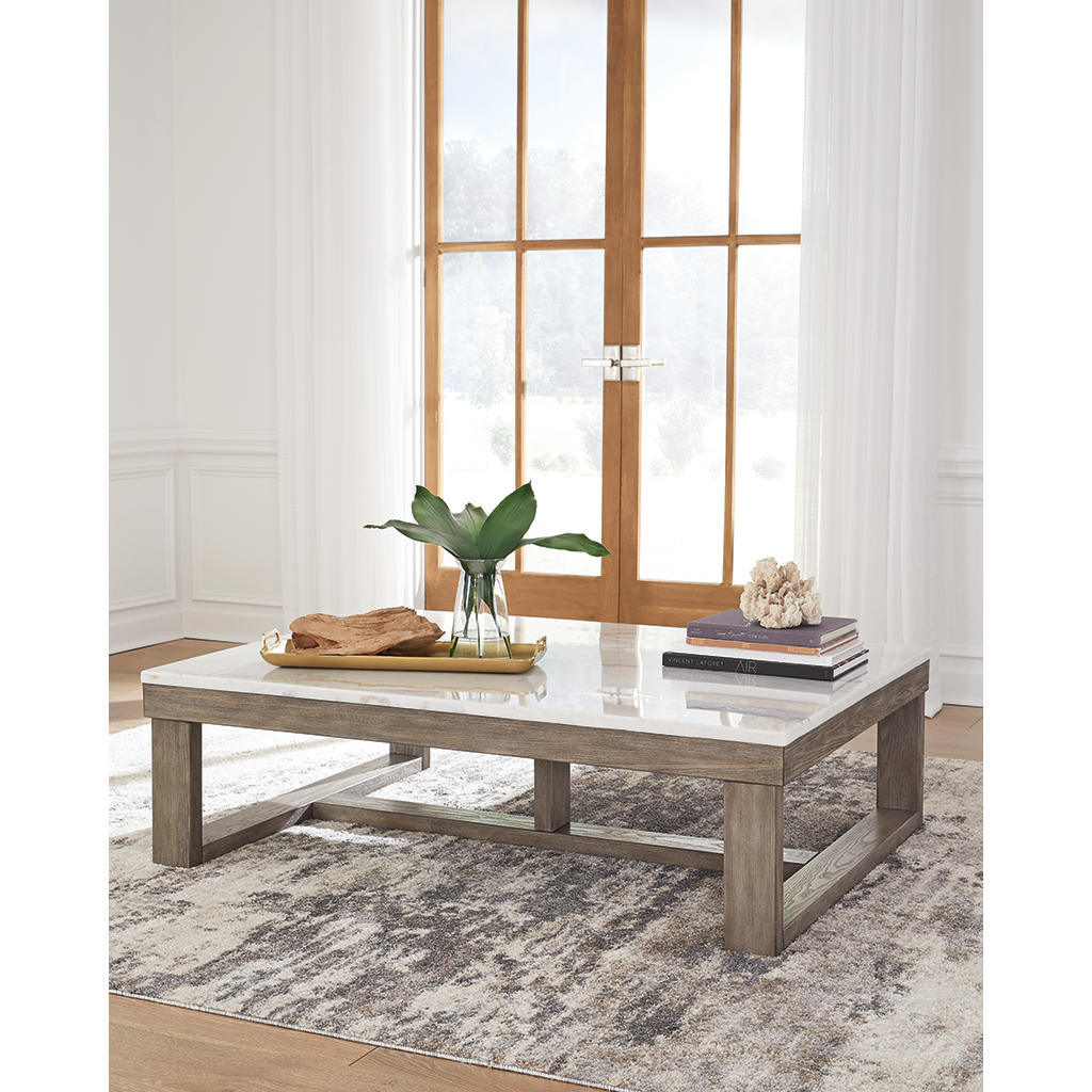 Loyaska Coffee Table — Natural Marble Top on Oak-Tone Base Signature Design by Ashley® Living Room