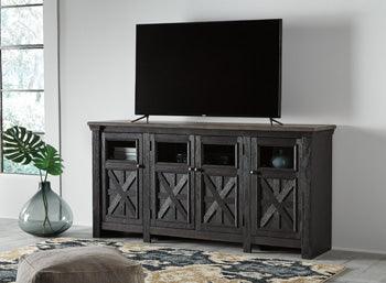 Tyler Creek 74 Inch TV Stand — Glass Doors Signature Design by Ashley® Living Room