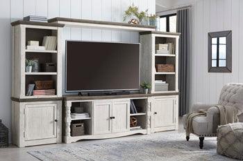 Havalance 4-Piece Entertainment Center — Two-tone Signature Design by Ashley® Furniture